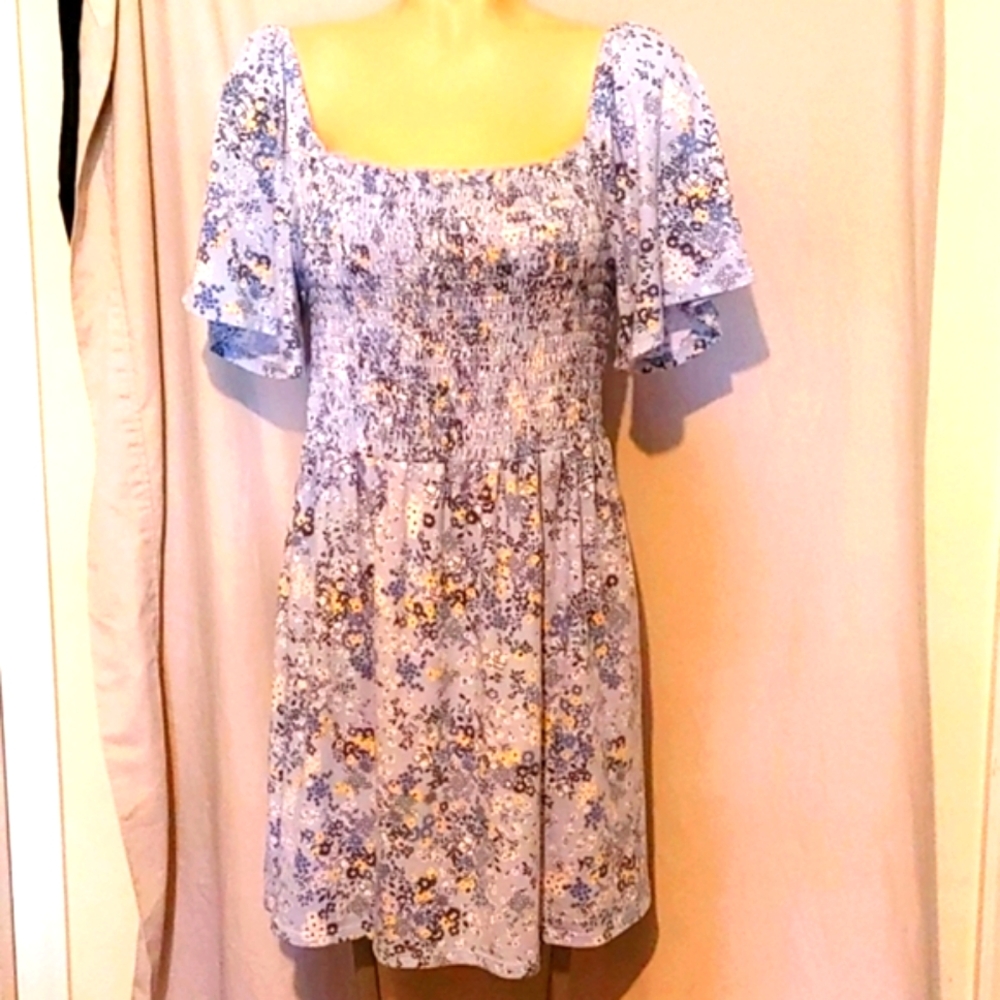 Smocked style fitted blue floral dress